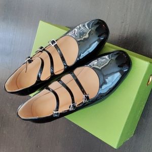 Buckled patent leather Mary Jane shoes